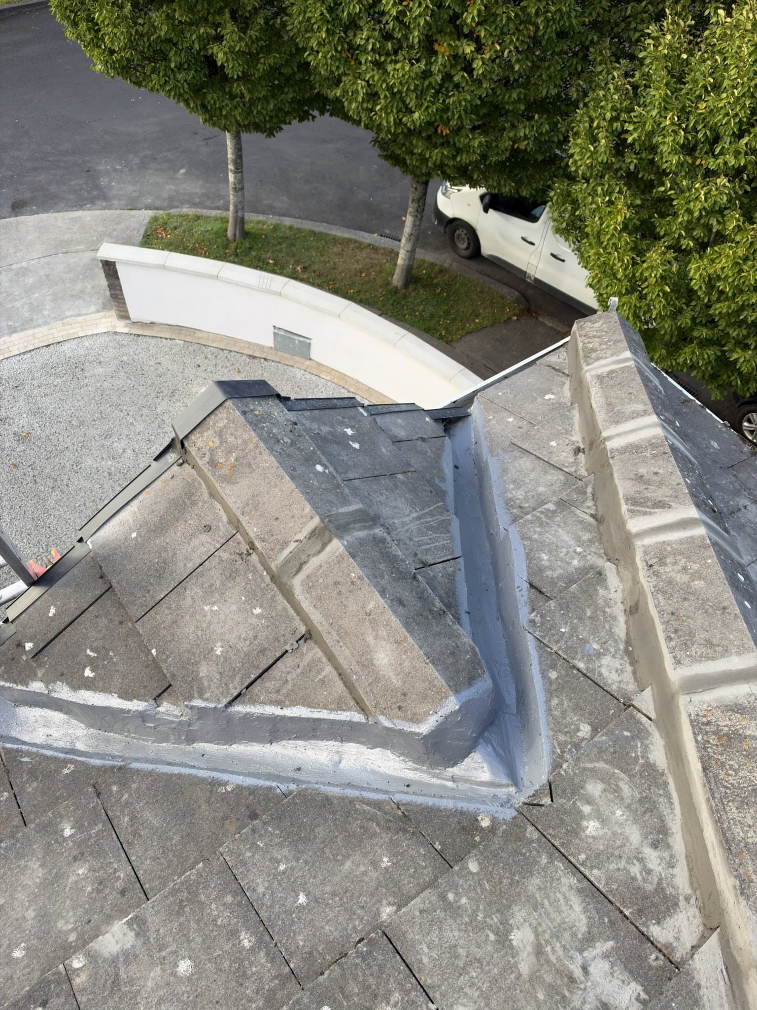 Coated valley channel, renewed ridge mortar and dry verge covers in Clonsilla.