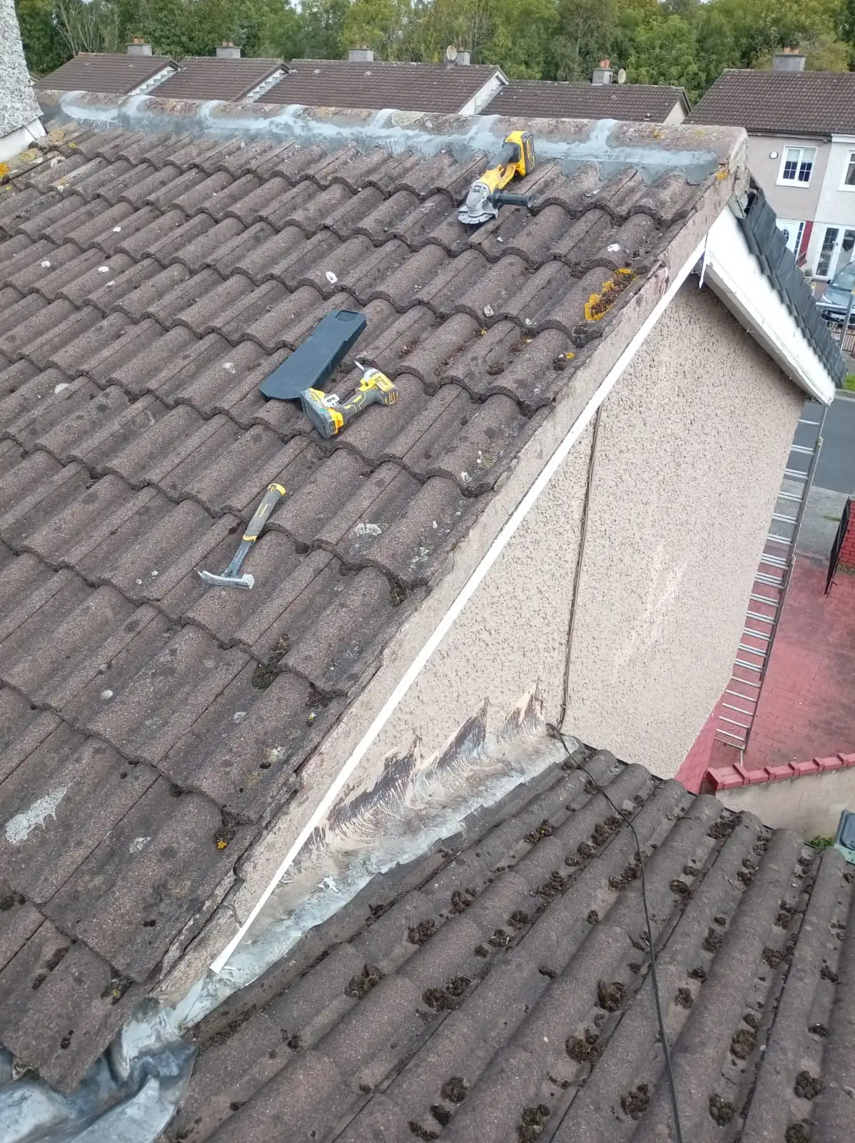 Fresh ridge pointing beside the unfinished gable verge at the Whitestown home.